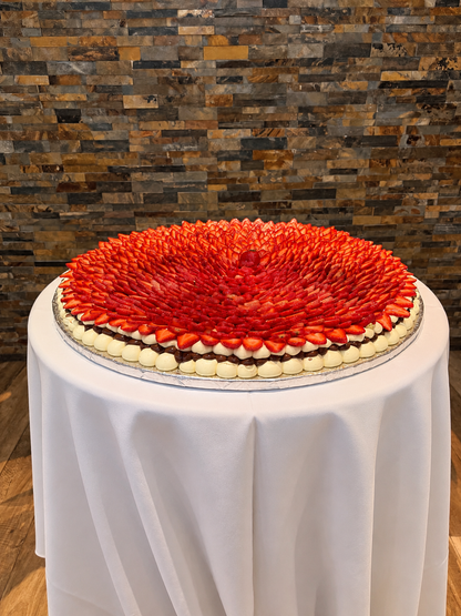 Wedding Pavlova displayed on a white table